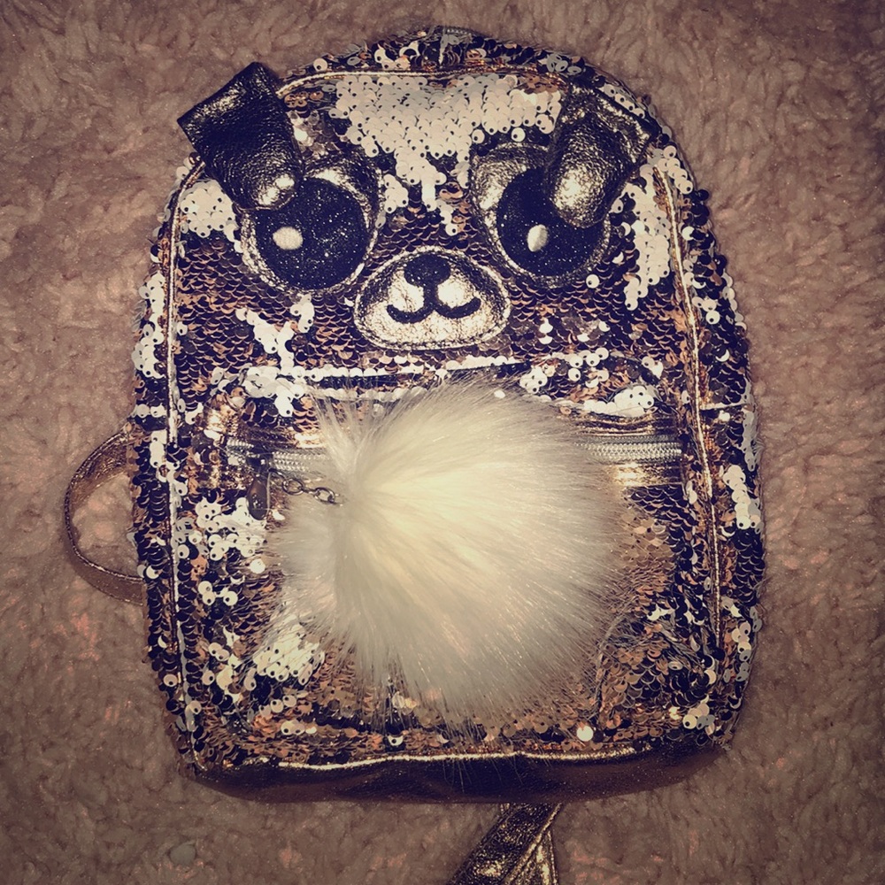 Reversible mini backpack